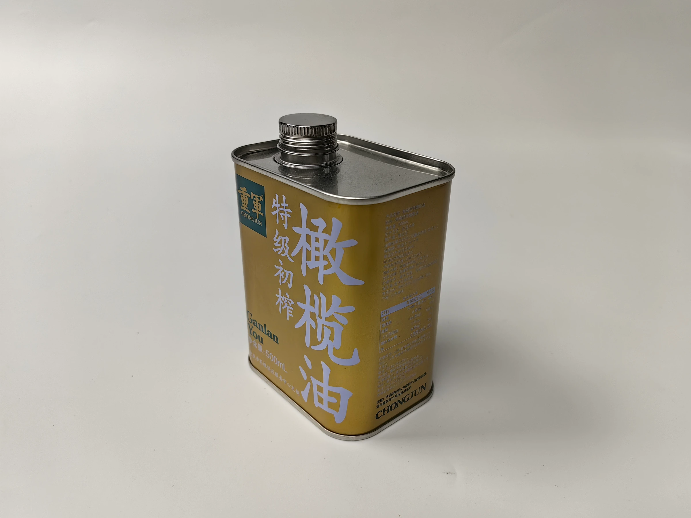 Three-quarter view of rectangular edible oil tin